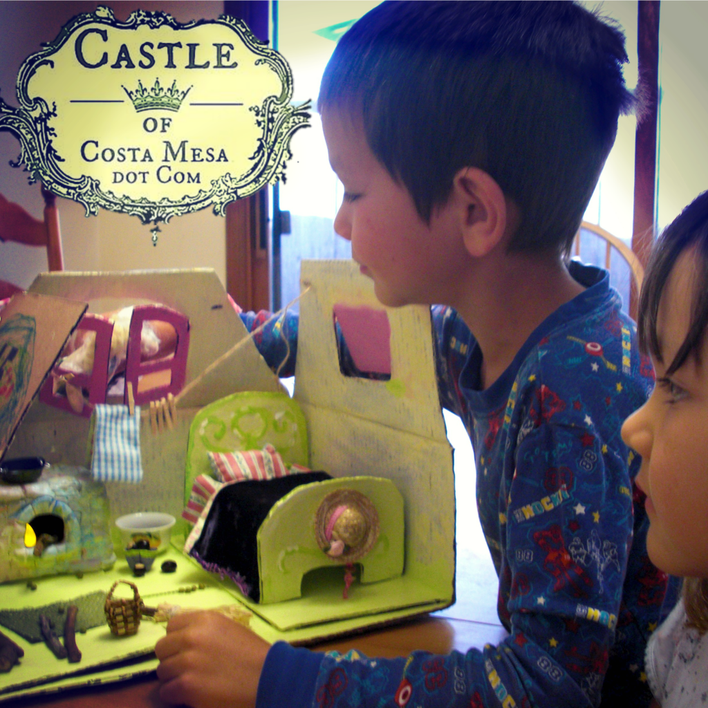 130801 Vi and Nu playing with Katya's handmade corrugated cardboard dollhouse. Square.