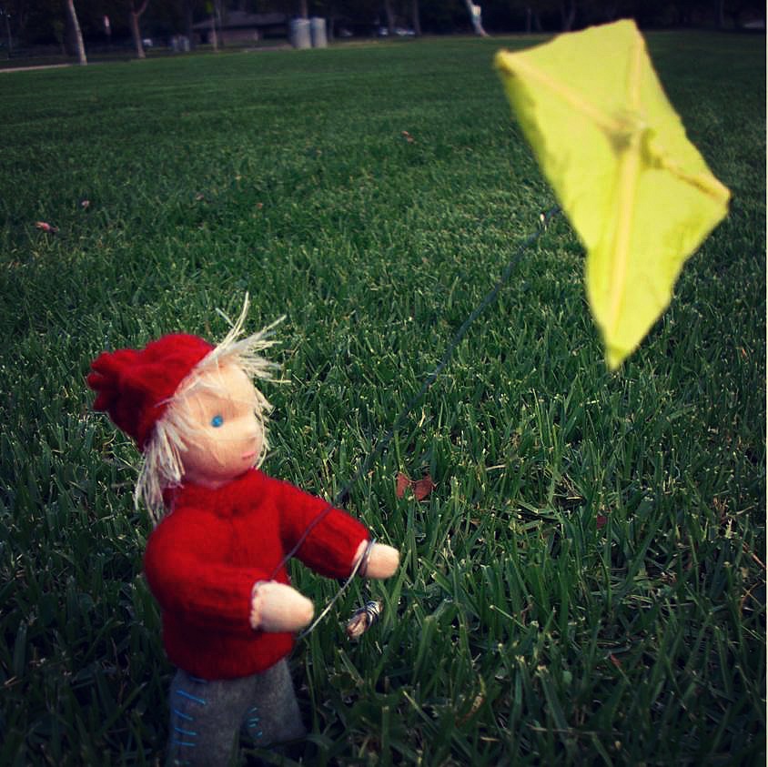 130925 Windswept hair, red lambswool sweater, yellow kite blonde handmade Nova Scotia Kite boy Fall Autumn Waldorf Seasons Nature Table square cropped. 