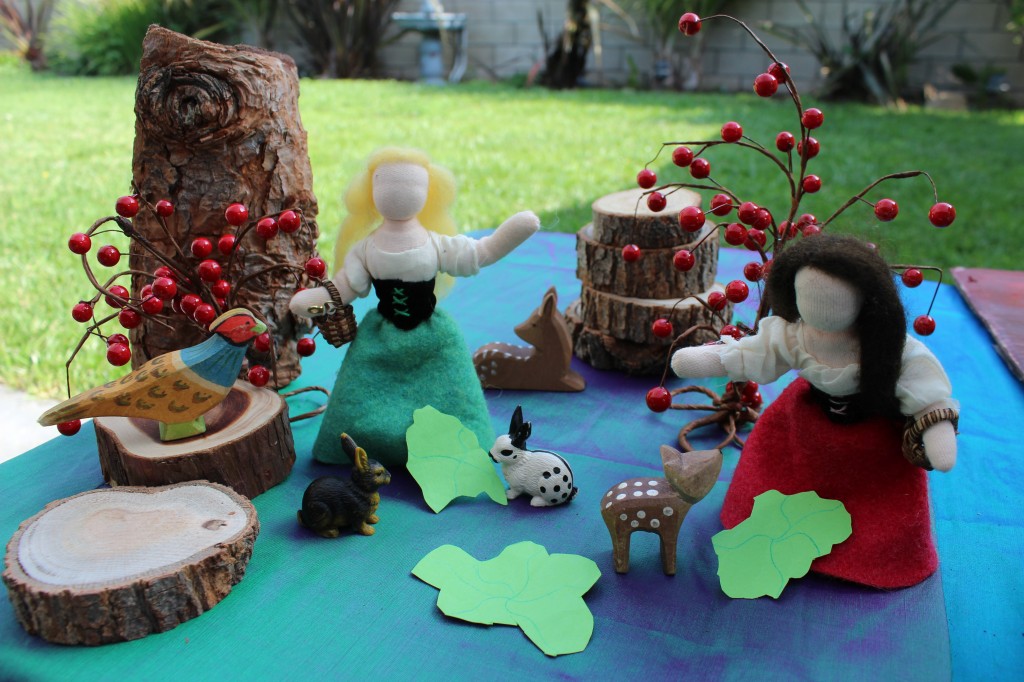 Snow White and Rose Red gathering berries. Handmade and homespun puppet theatre by CastleofCostaMesa.com