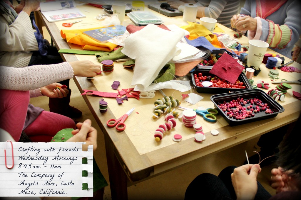 121212 Crafting with friends. Many busy crafting hands and craft supplies materials