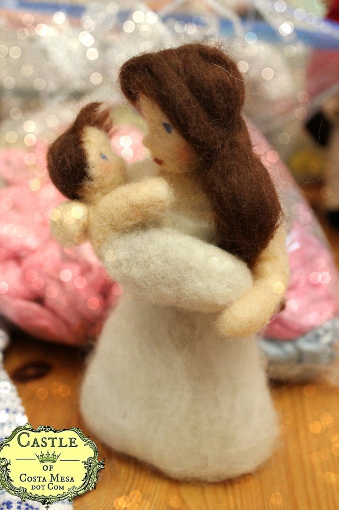 130418 Mother gazing lovingly at her babe in arms. Needle-felted woman in white with baby.