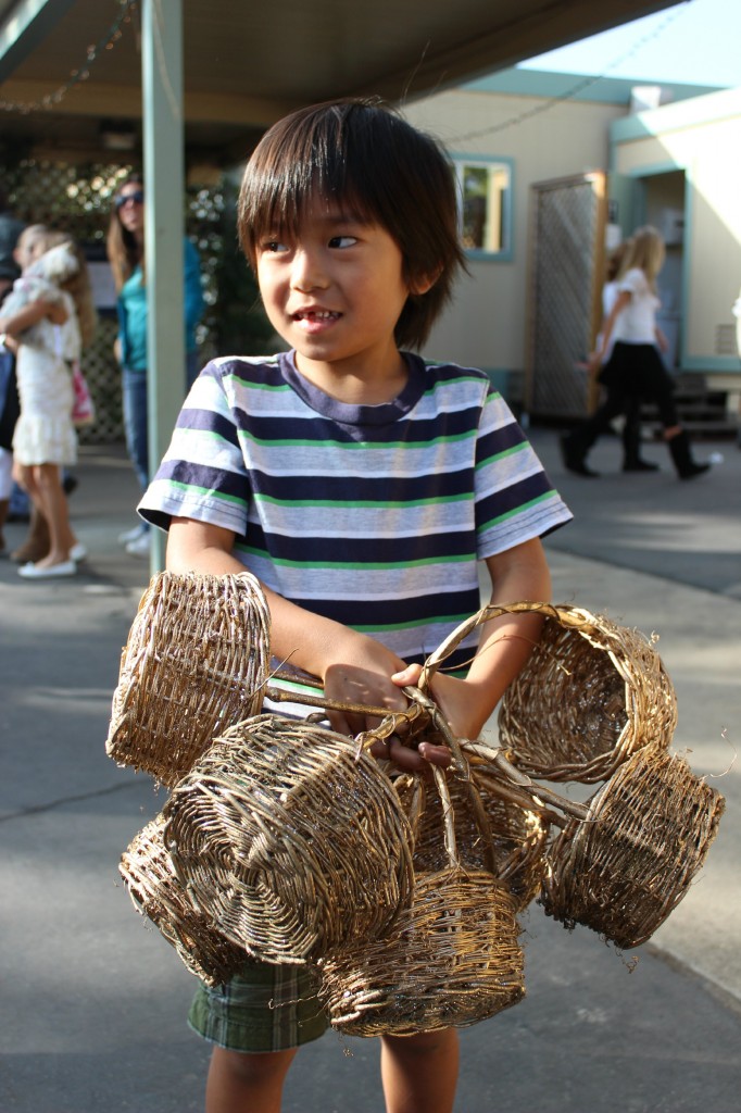 Little boy with elves workshop baskets