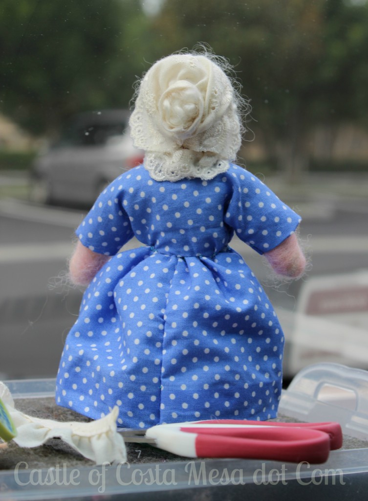 The Old Lady miniature doll back view. Bonnet and bun