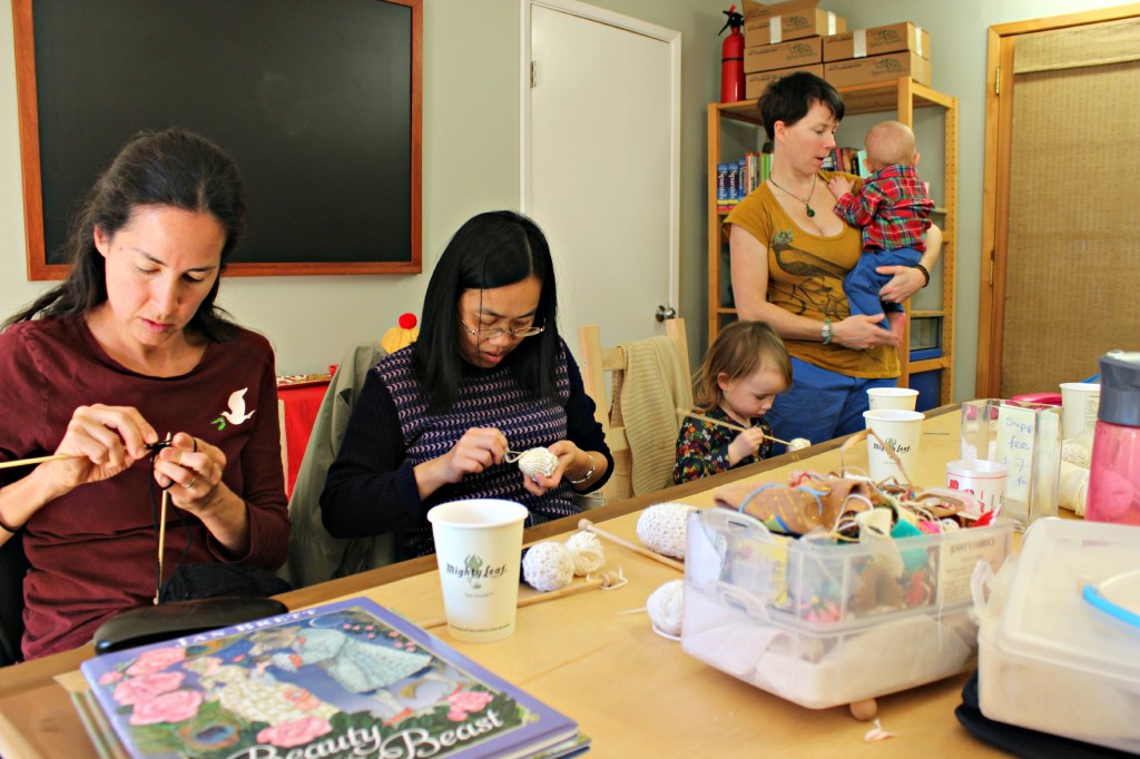130116 Knitters of all sizes rapt at work