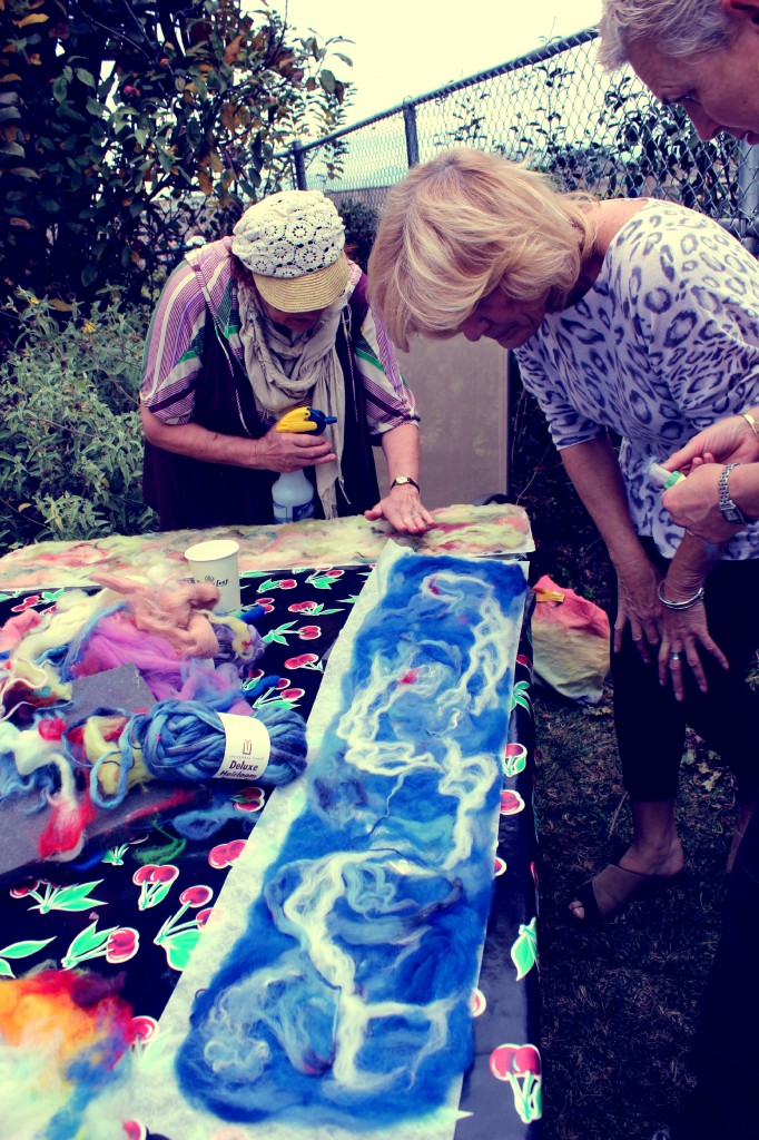 130123 Christine examining Rachel's blue Artfelt scarf project  2