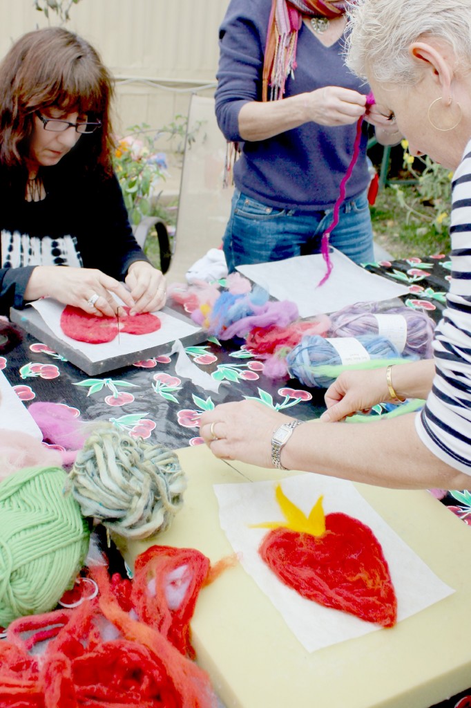 130123 Rachel and Julie making valentine hearts with roving on Artfelt paper