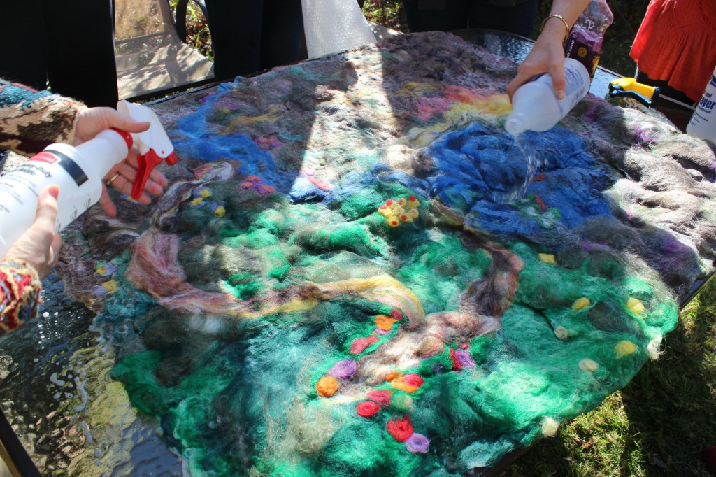 130130 Adding hot water and soap to wet felt our playscape blanket