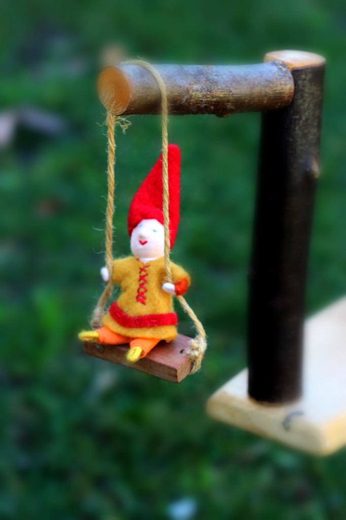 130226 Miniature gnome boy on swing.