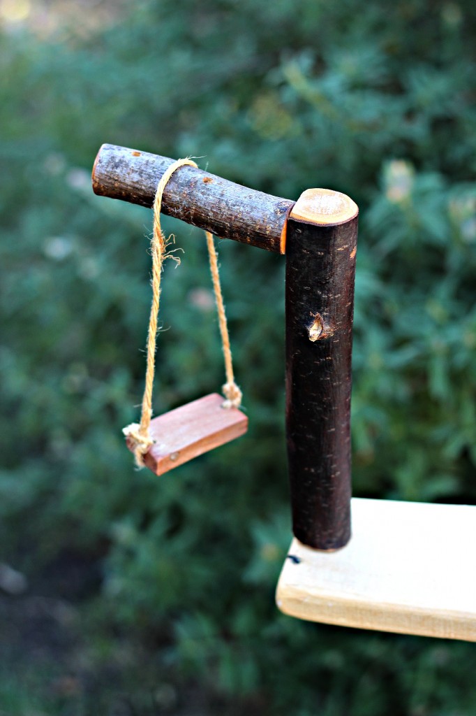 Simple Waldorf wooden miniature swing