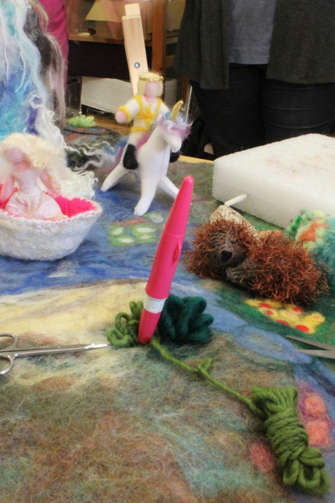 130213 adding yarn and pencil roving as grass for wet-felted playscape