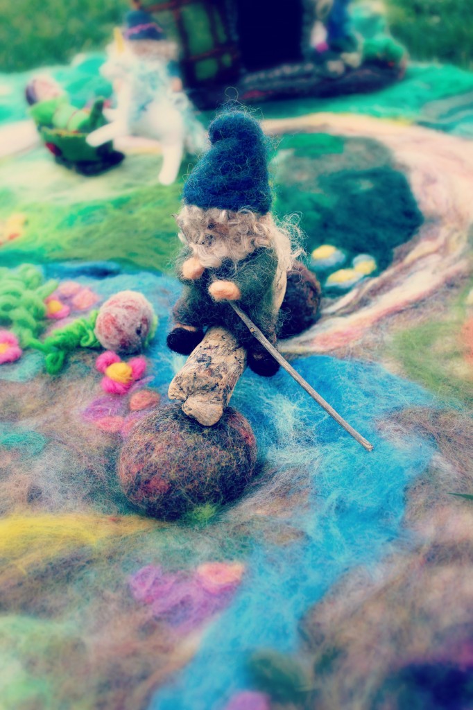 130227 The little needle-felted gnome sitting atop a stream