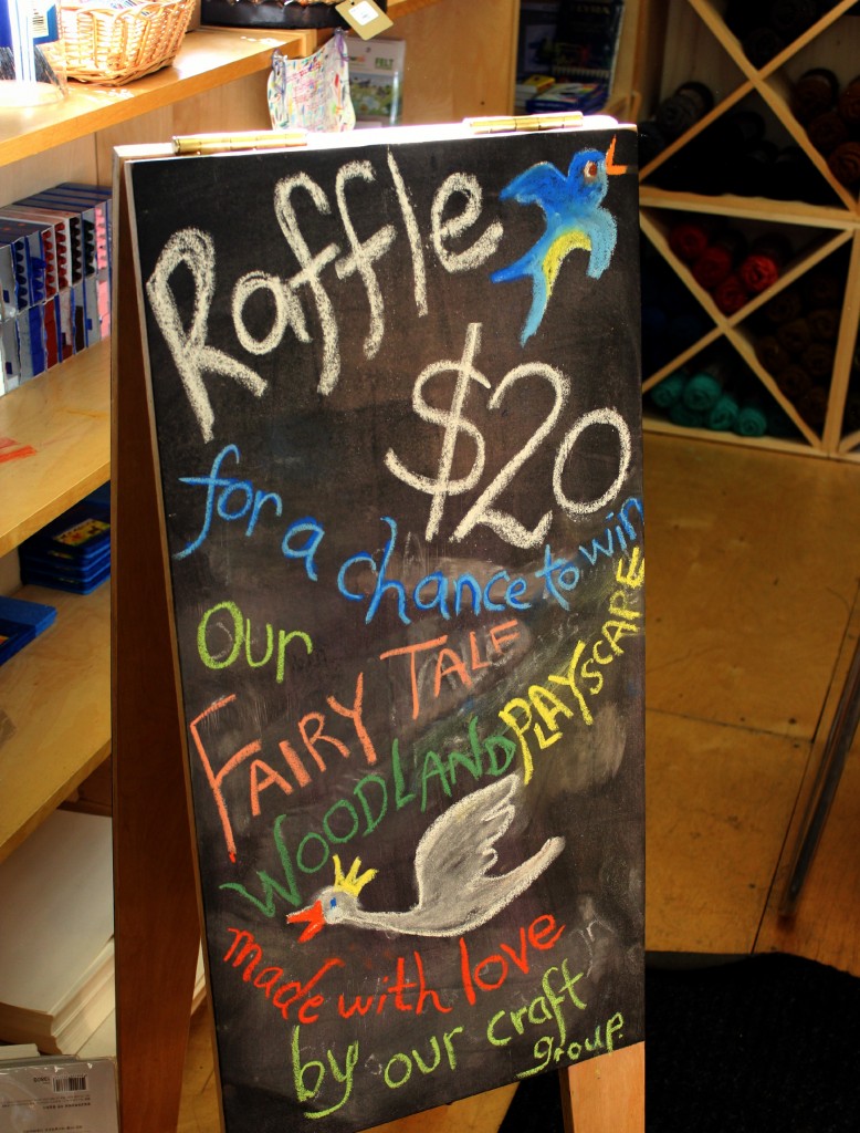 130308 Chalkboard announcing craft group raffle ticket sale