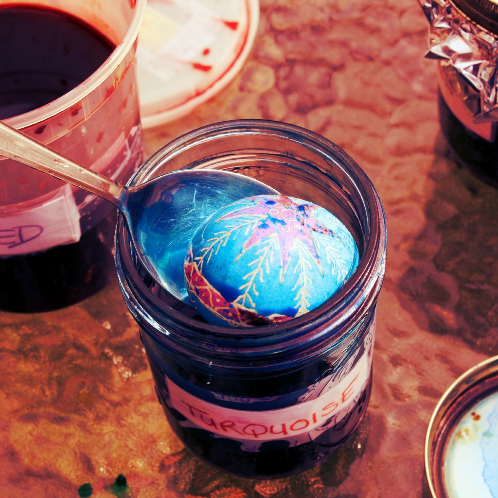 130320 Julia's Ukrainian egg dipped in turqoise dye in jar.