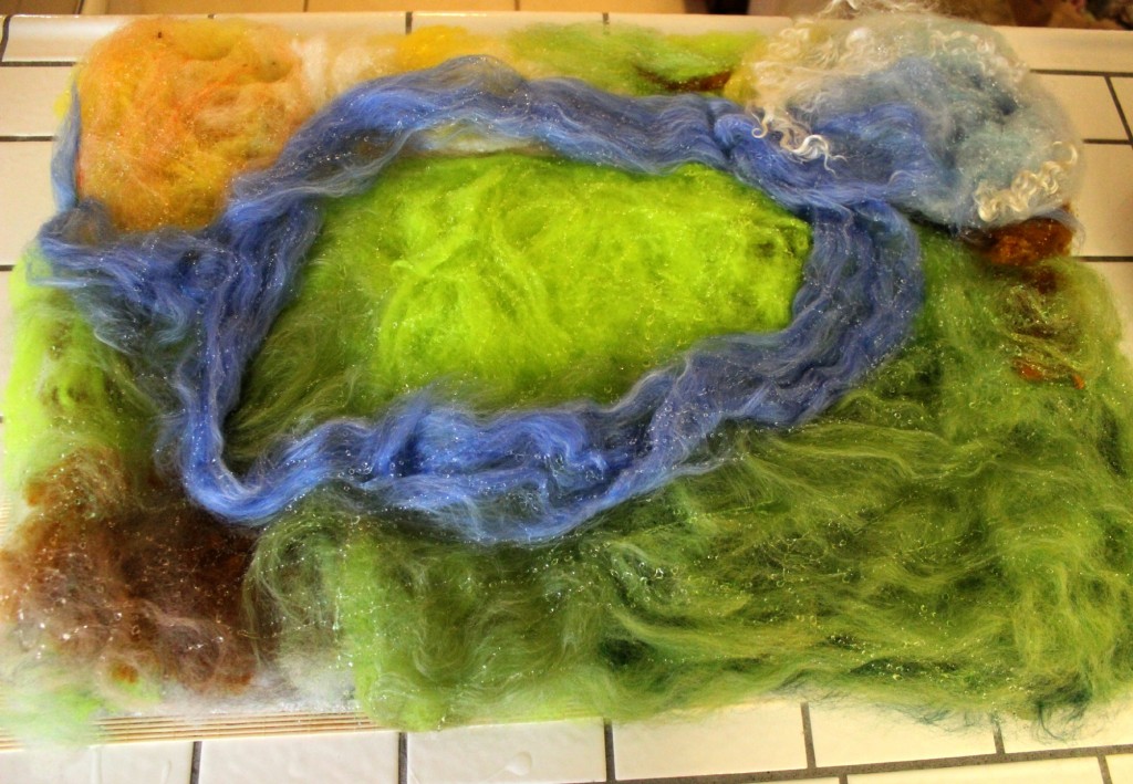 130405 Drizzled thin streams of liquid dishwashing detergent onto wool roving for wet-felting playscape