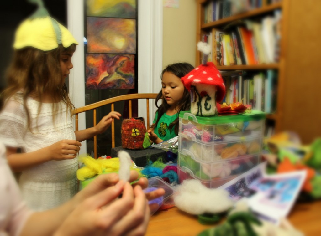 130403 Anicka felting yellow windows onto her gnome home