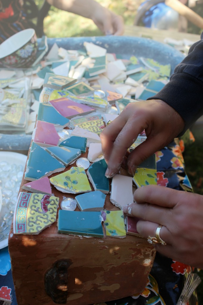 130410 Gaby arranging tile on fairy garden planter for her first grader