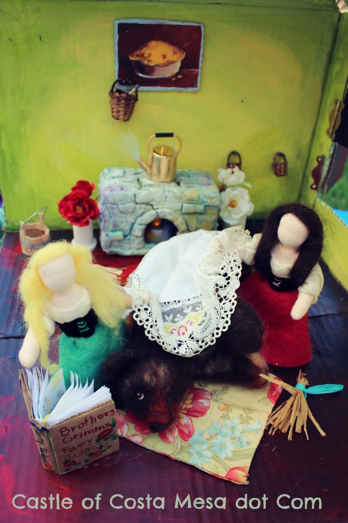 130428 Sisters with bear and doily in kitchen with logo