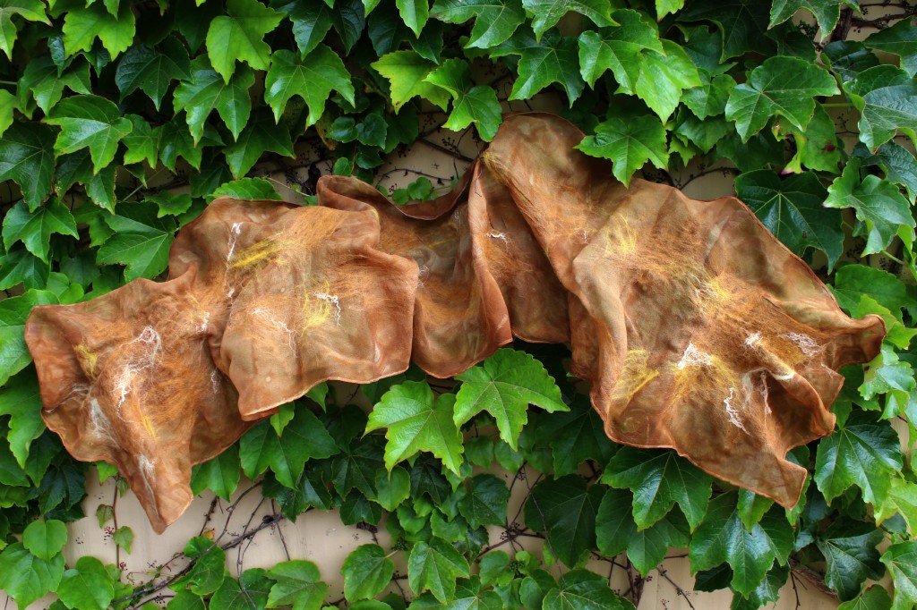 130501 Christine's brown Nuno-felted scarf on Company of Angels ivy wall