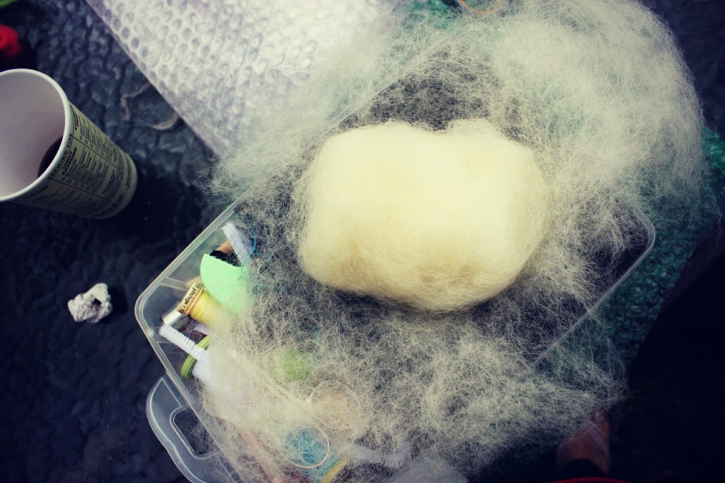 130501 process of wrapping wool batting around soap bar for wet-felting