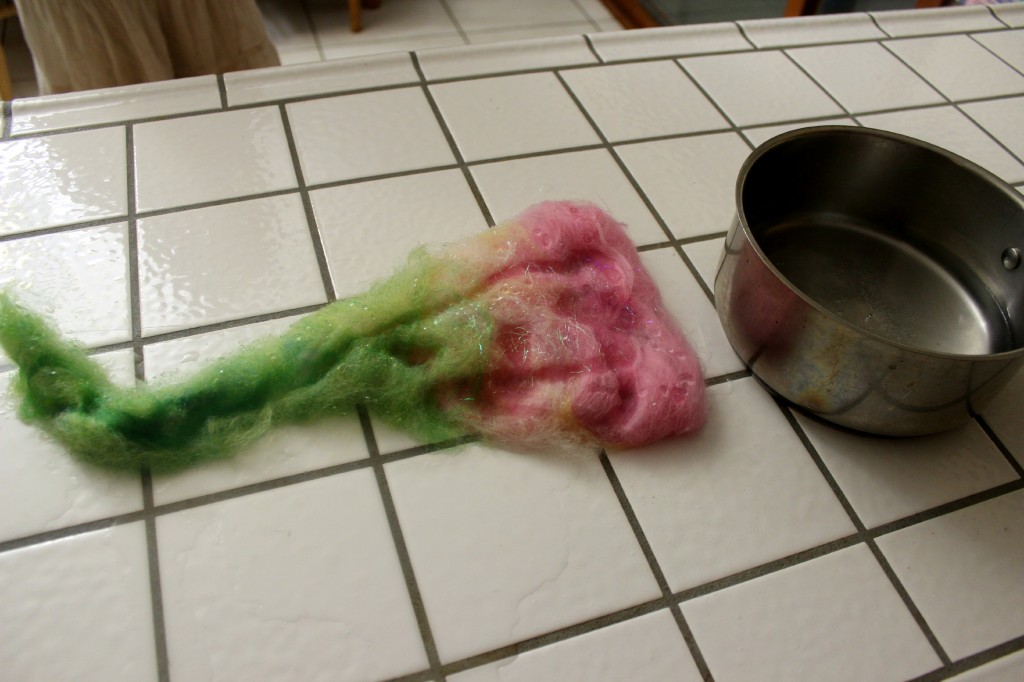 130519 pouring boiling water onto soapy wool to wet-felted baby flower hat costume