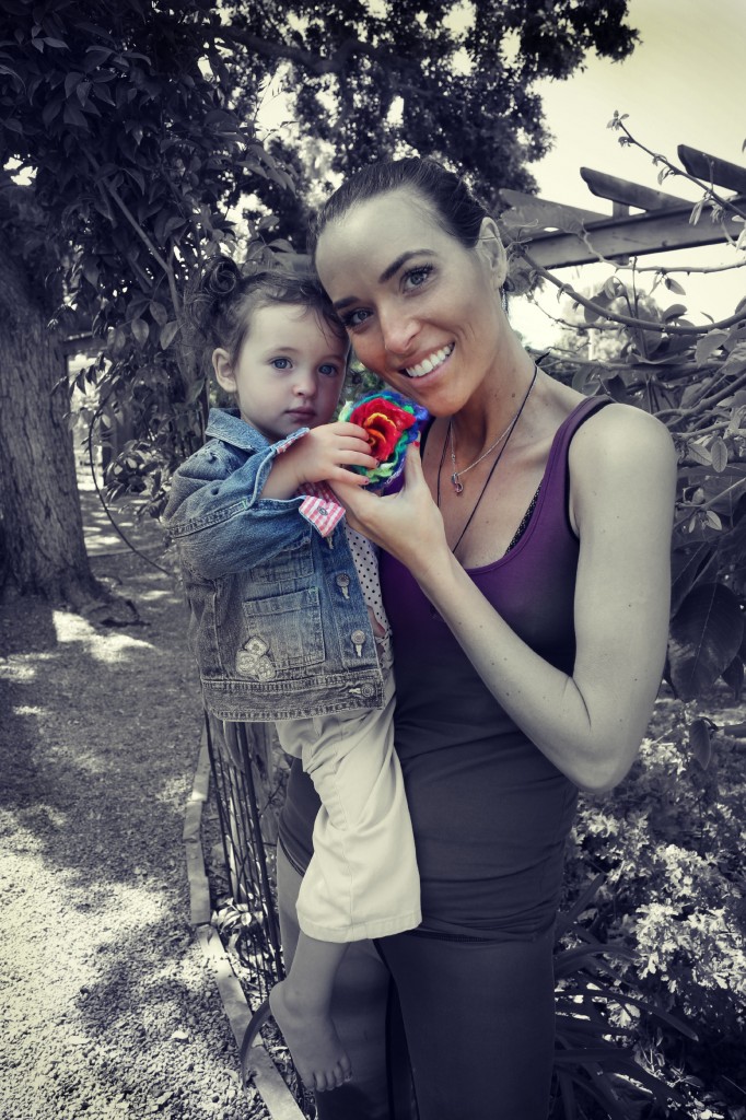130529 Pia and baby Solana with finished wet-felted flower in garden