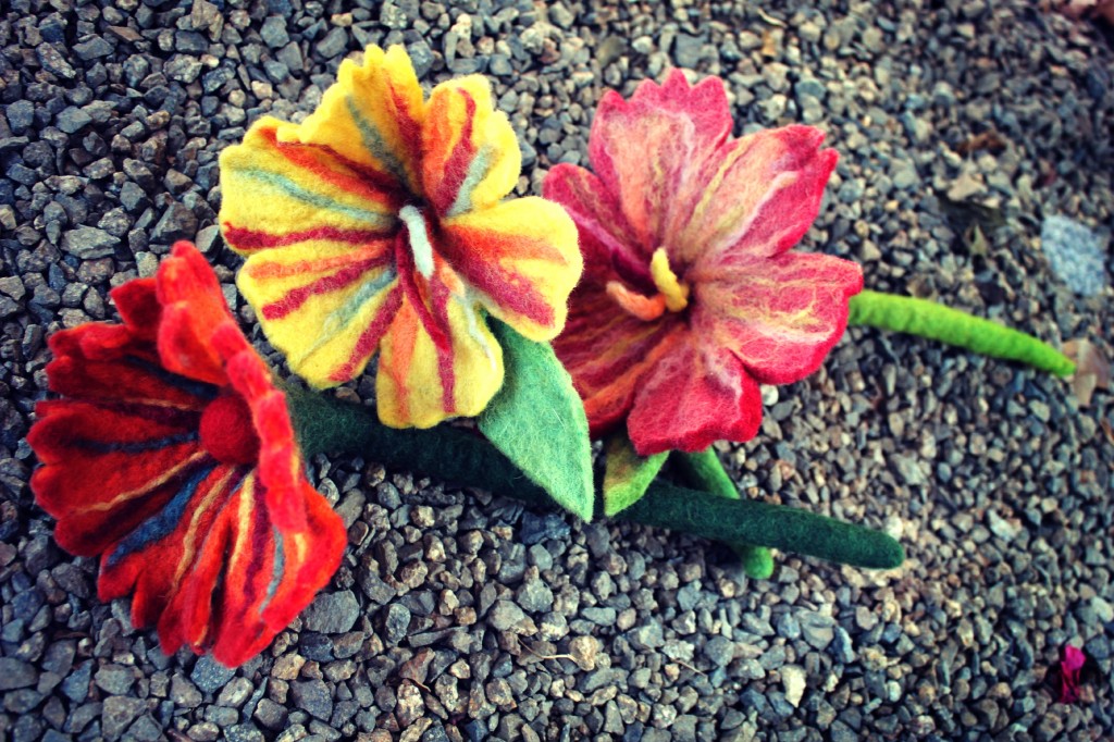 130529 Rachel's 3 wet felted flowers with stems on gravel