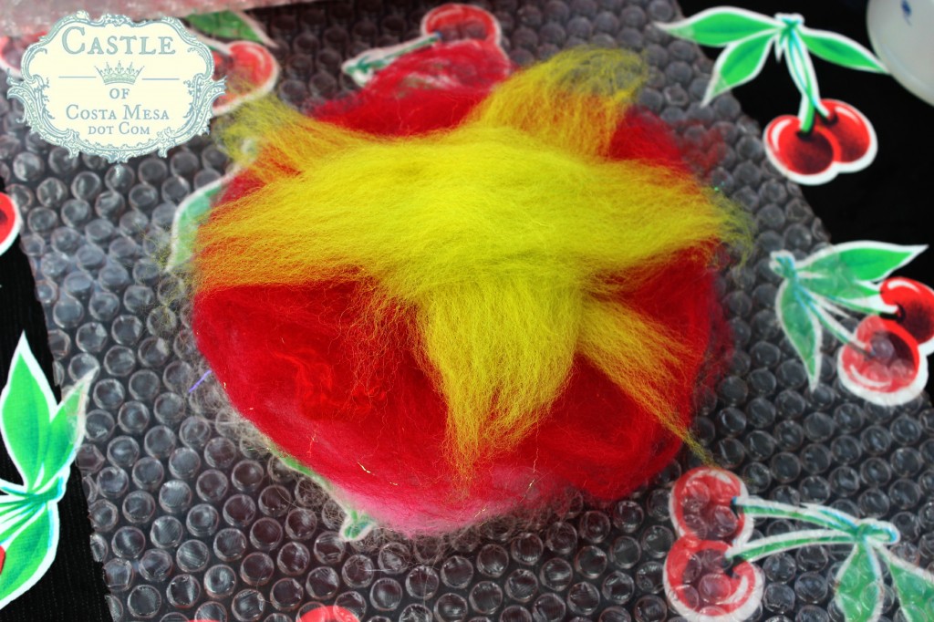 130605 Jzin's arrangement of wool roving colors to form a flower with sepals