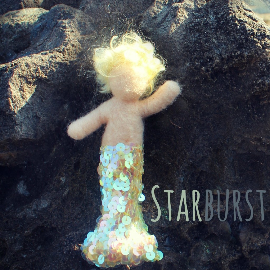 1309012 square. blonde merbaby Starburst waving in the sunshine. No logo