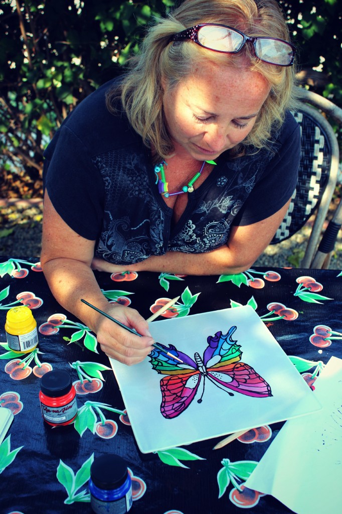 130910 Denise painting her rainbow swallowtail butterfly on silk