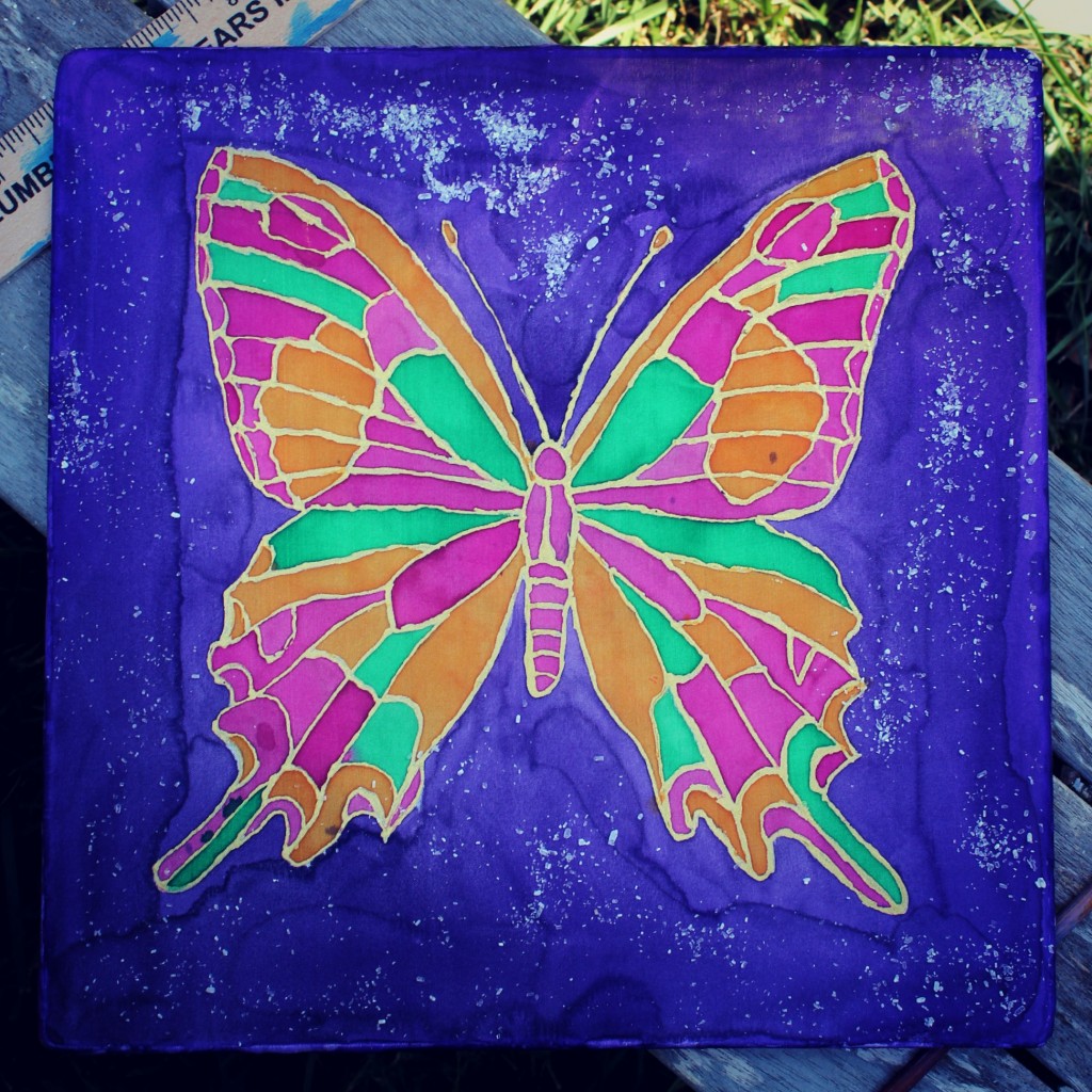 130910 Yvonne's silk painting pink and orange swallowtail butterfly drying in the sun.