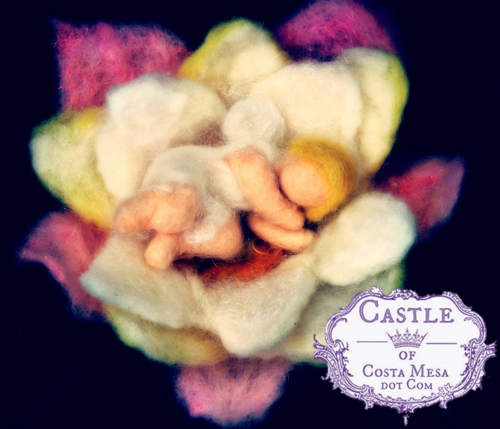 130917 Baby fairy curled up asleep in a wet felted flower