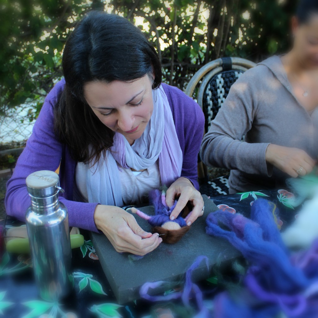 130924 Heather needle felting hair onto her purple lavendar pulled wool roving fairy angel doll ornament