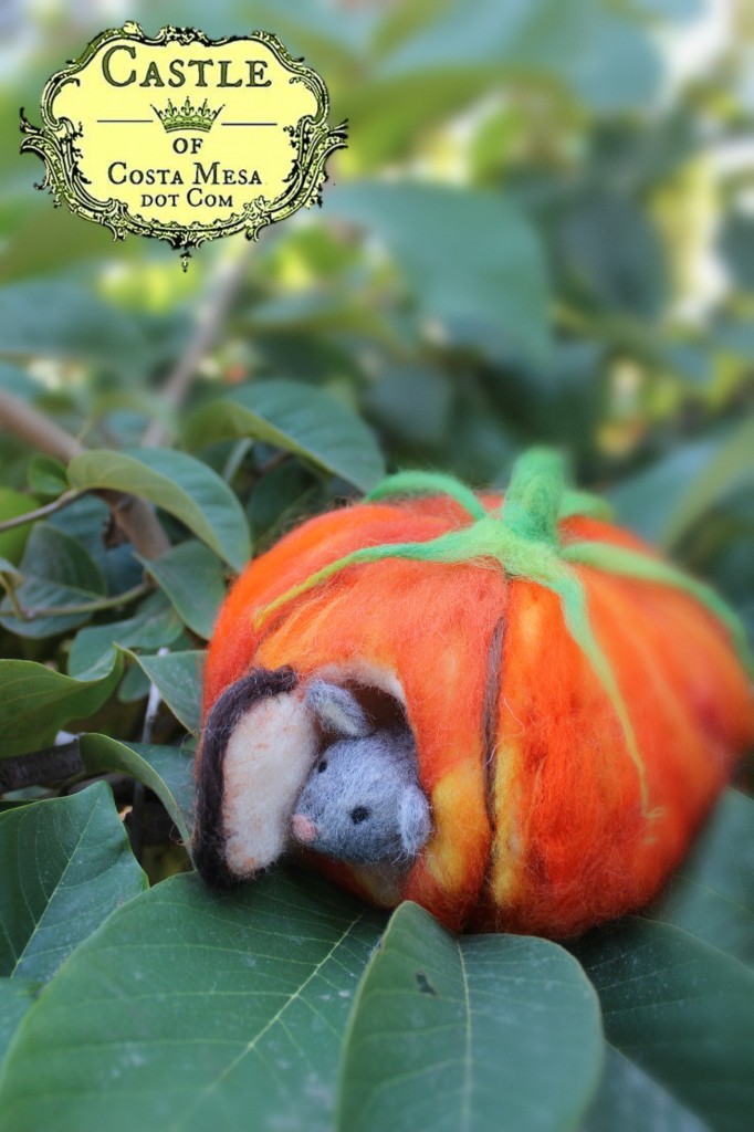 131015 Josephine's needle-felted mouse peering out the door of his orange pumpkin house front door on foggy morning
