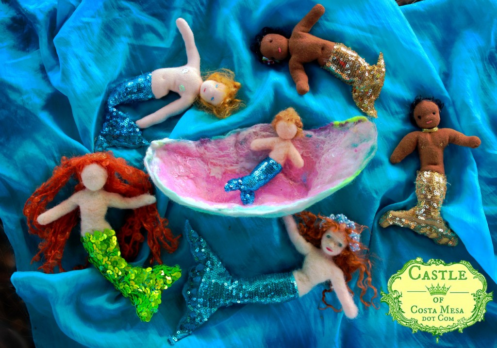 131030 Ring of glittering mermaid on blue silk around boat with merbaby Nigel sitting in it