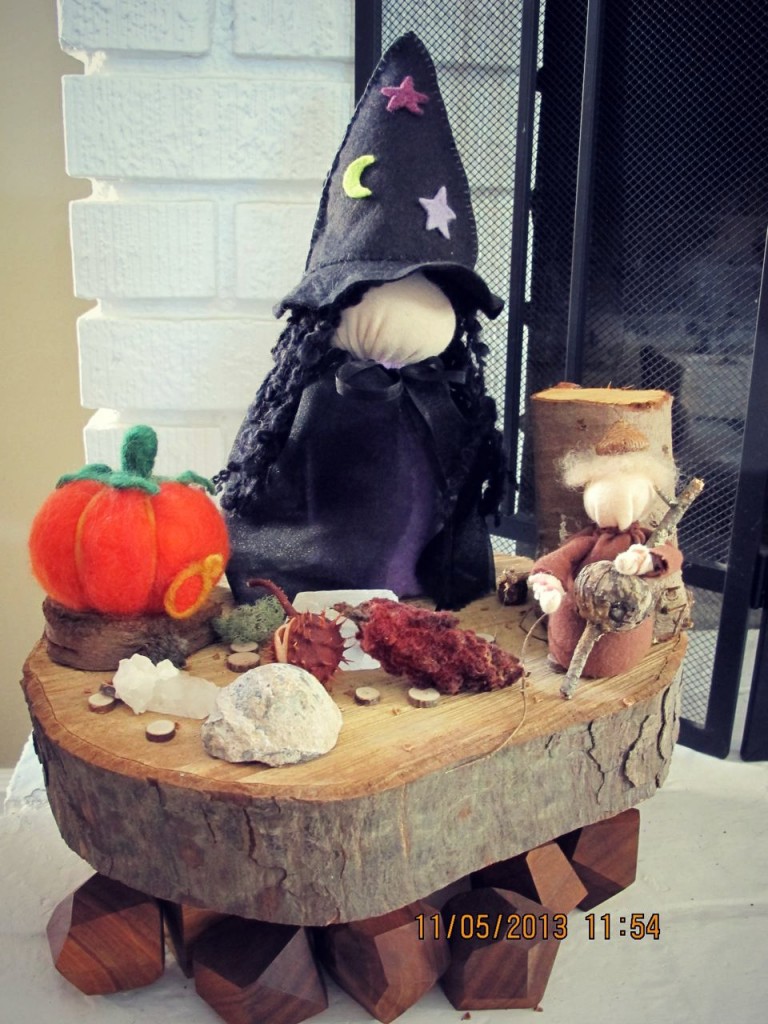 131107 Heather Sebring's completed Table Top Puppet Witch doll on her fall naturre table with a needle-felted pumpkin, acorn child and found natural objects.