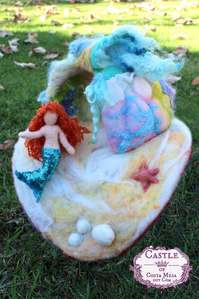 131201 Little needle-felted mermaid sitting in front of her mermaid cave.