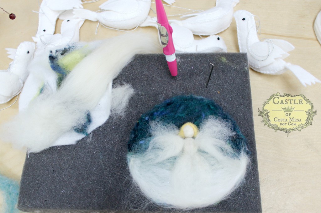 131203 Jzin's needle-felted holy picture of Winter angel on foam pad flocked by Josephine's handstitched felt white doves