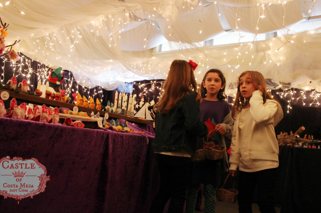 131207 Three girls in awe with the plethora of choices at Elves Workshop