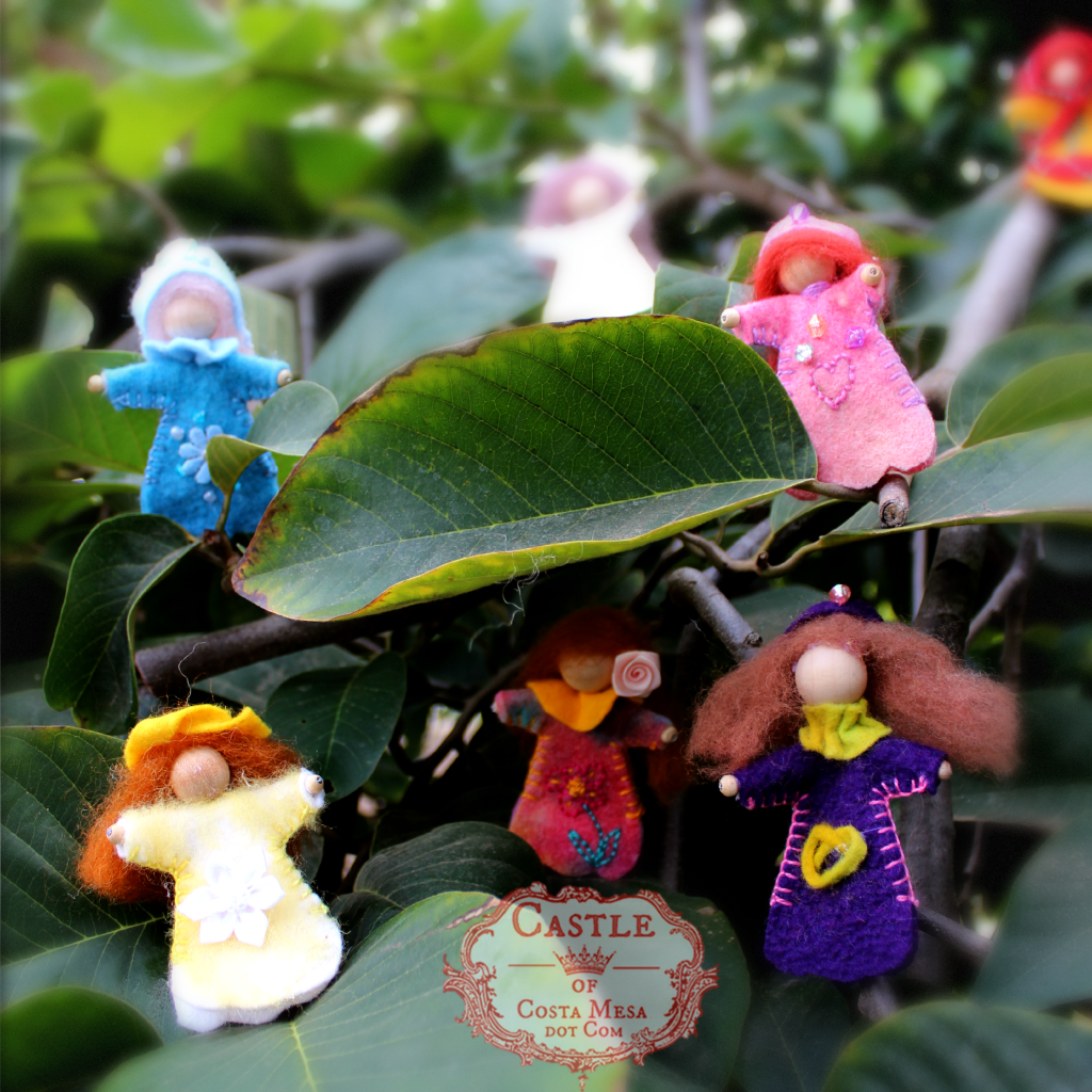 131209 Alena's blossom fairies playing hide and seek in the cherimoya tree. Square cropped