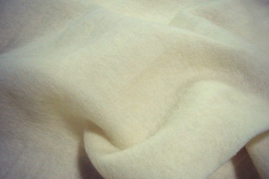 White undyed 100 percent wool prefelt, used as backing for needle-felted pictures