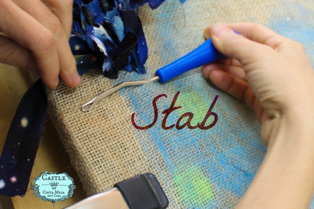 140107 Hooked rug tutorial Stab your hook through the open weave of your burlap base with a latch tool or crochet hook.