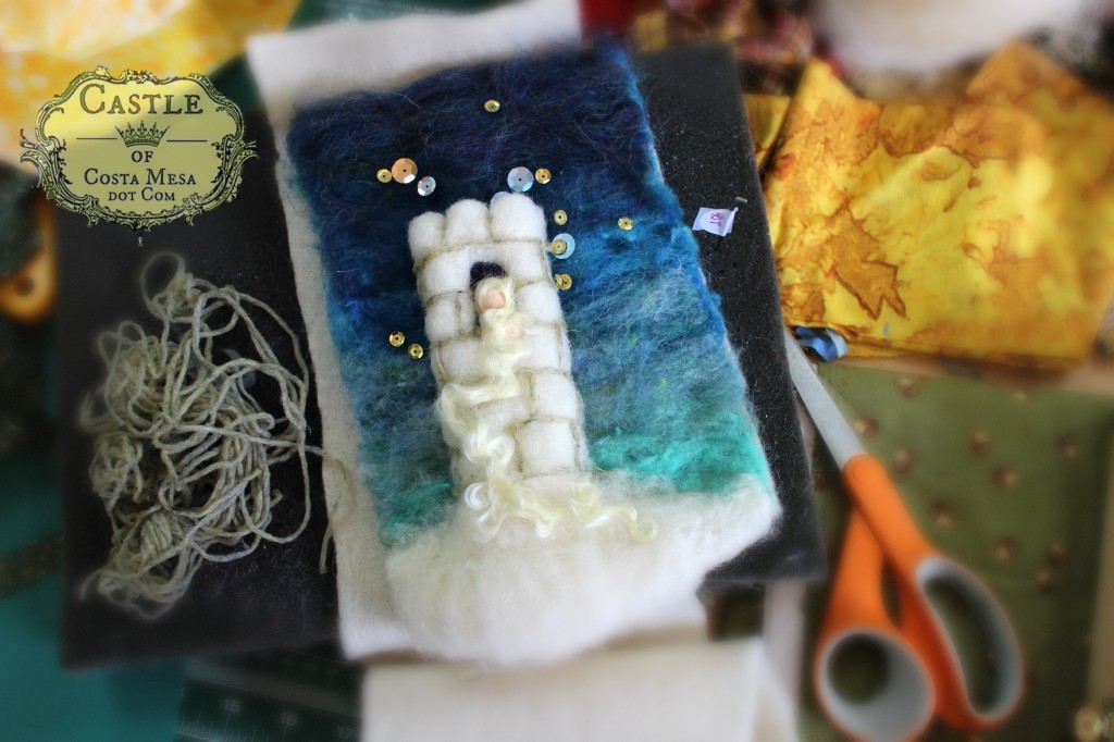 140107 Jzin's needle-felted wool picture of Rapunzel in snowy tower under sequinned starlight.