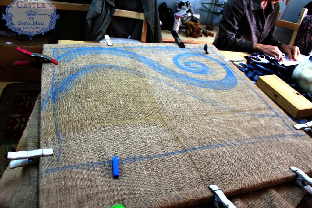 140107 sketching out rug design onto stretched burlap on wooden frame