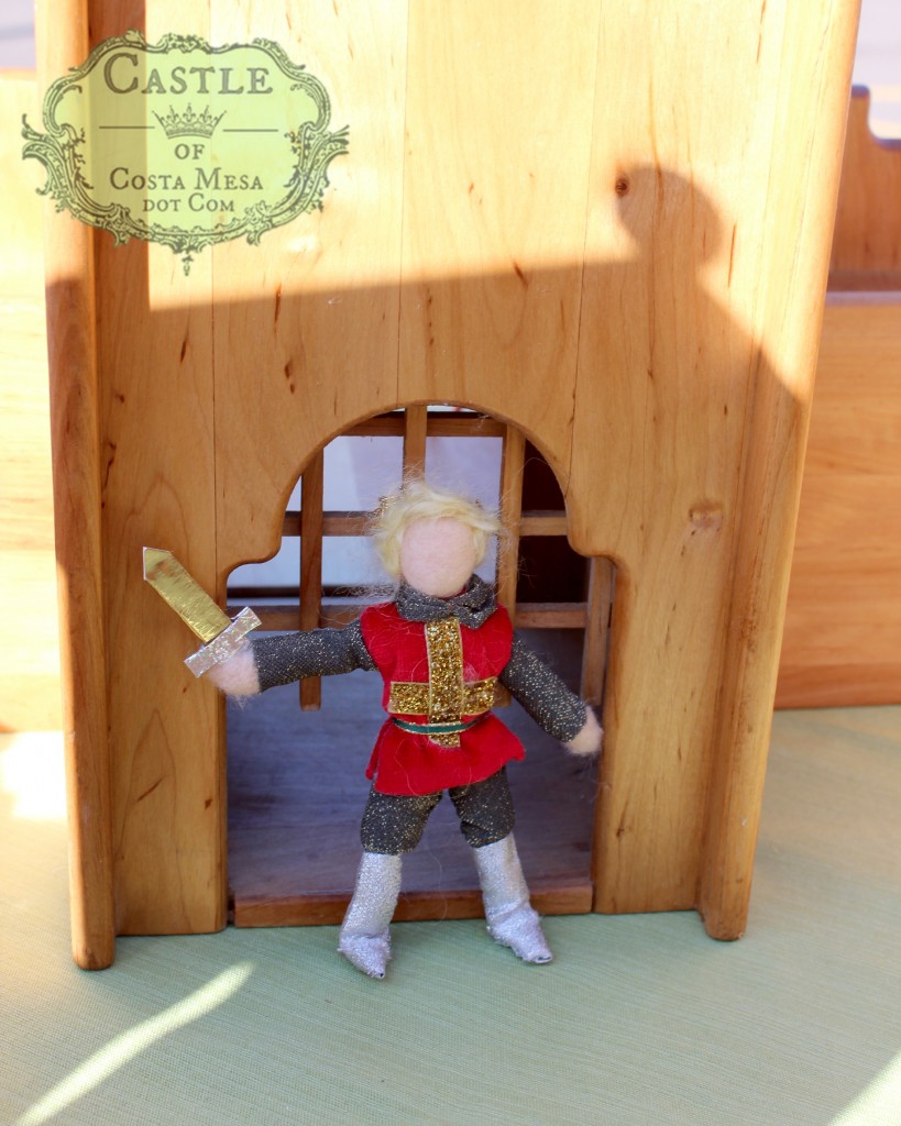 140210 Golden knight trapped behind movable wooden portculis of the Schlingl Schloss. with logo