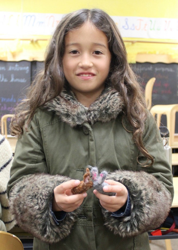 140210 Second Grader Sara with the two bunnies she needle-felted
