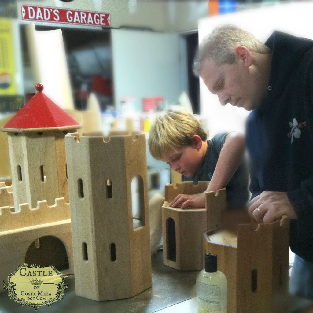 140212 Cole and Jonah Hellar oiling the Schlingl German wooden castle. square cropped.