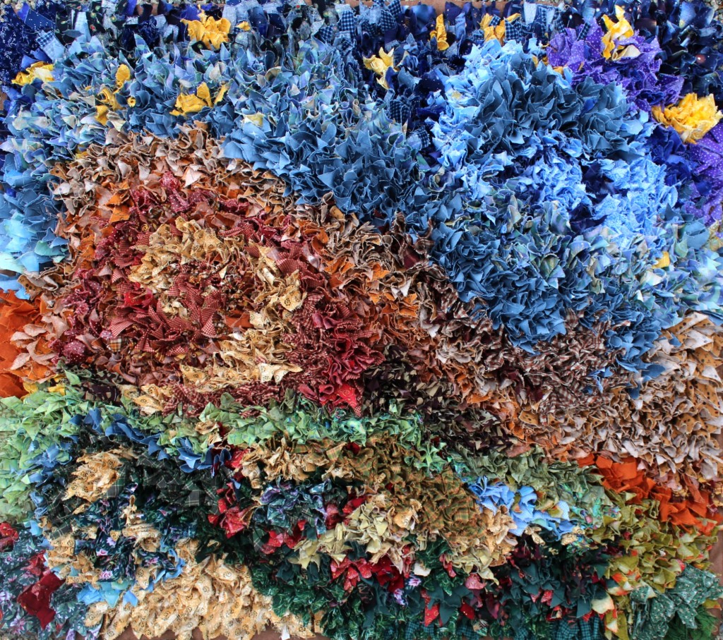 140313 The hooked rag rug is finally completed display on gravel 4 irregular close cropped