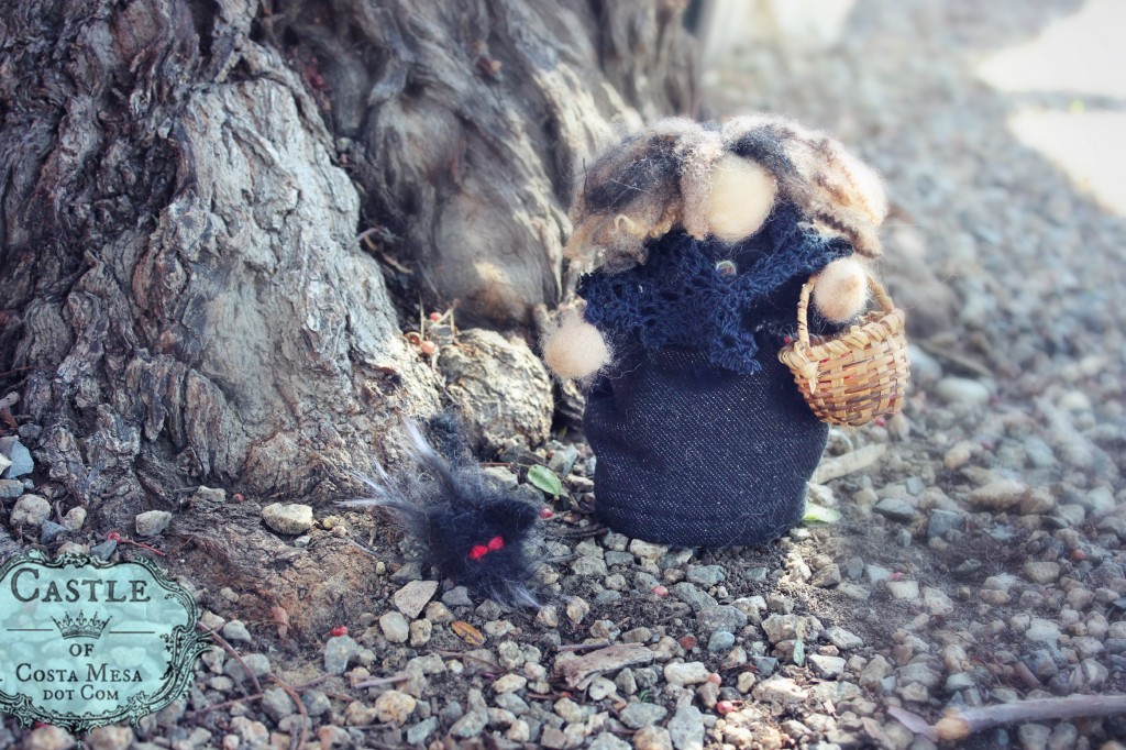 140310 Hannah's handmade doll witch and her black fuzzy cat on a stroll on rocky path