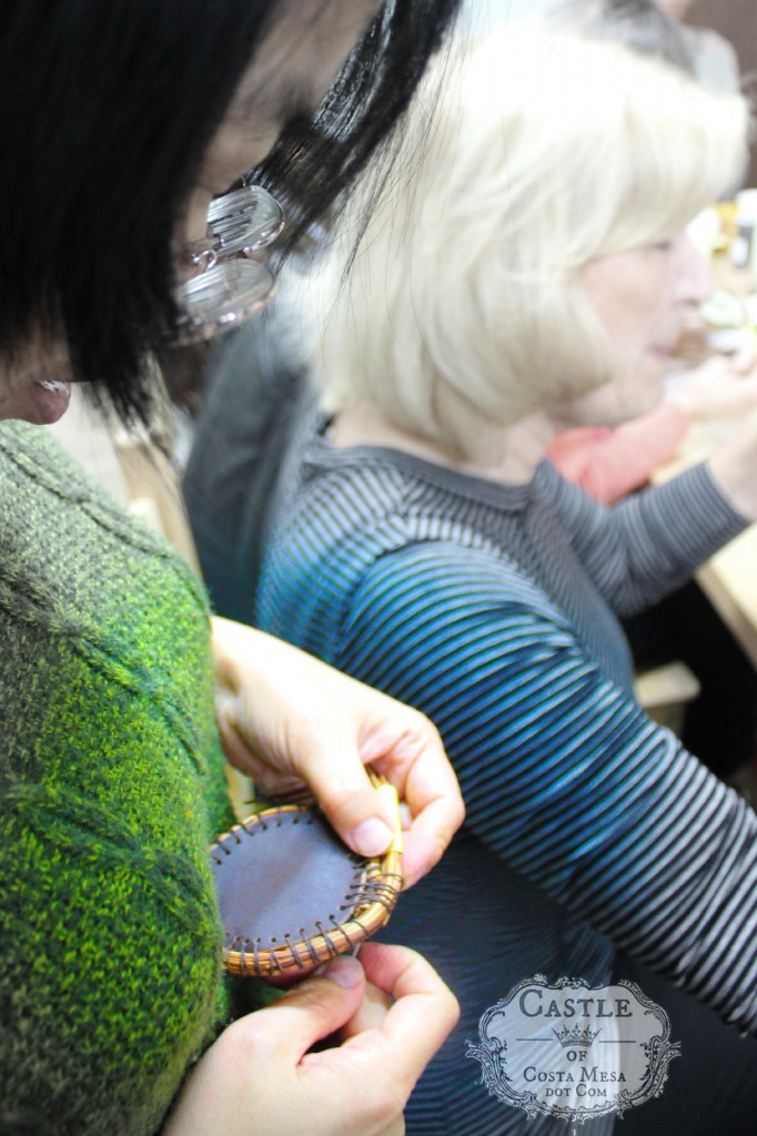 140304 Josephine sewing the base of her pine needle basket