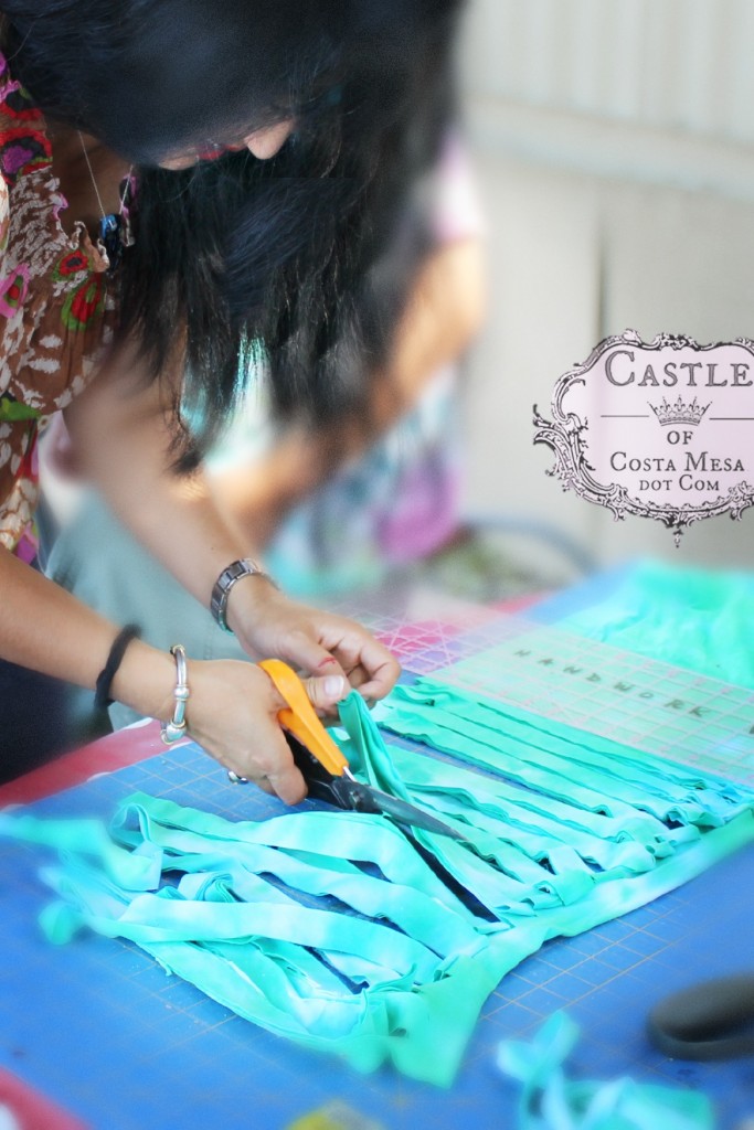 140917 Cathrine cutting 1 inch wide strips of hand-dyed T-shirt to make yarn 2